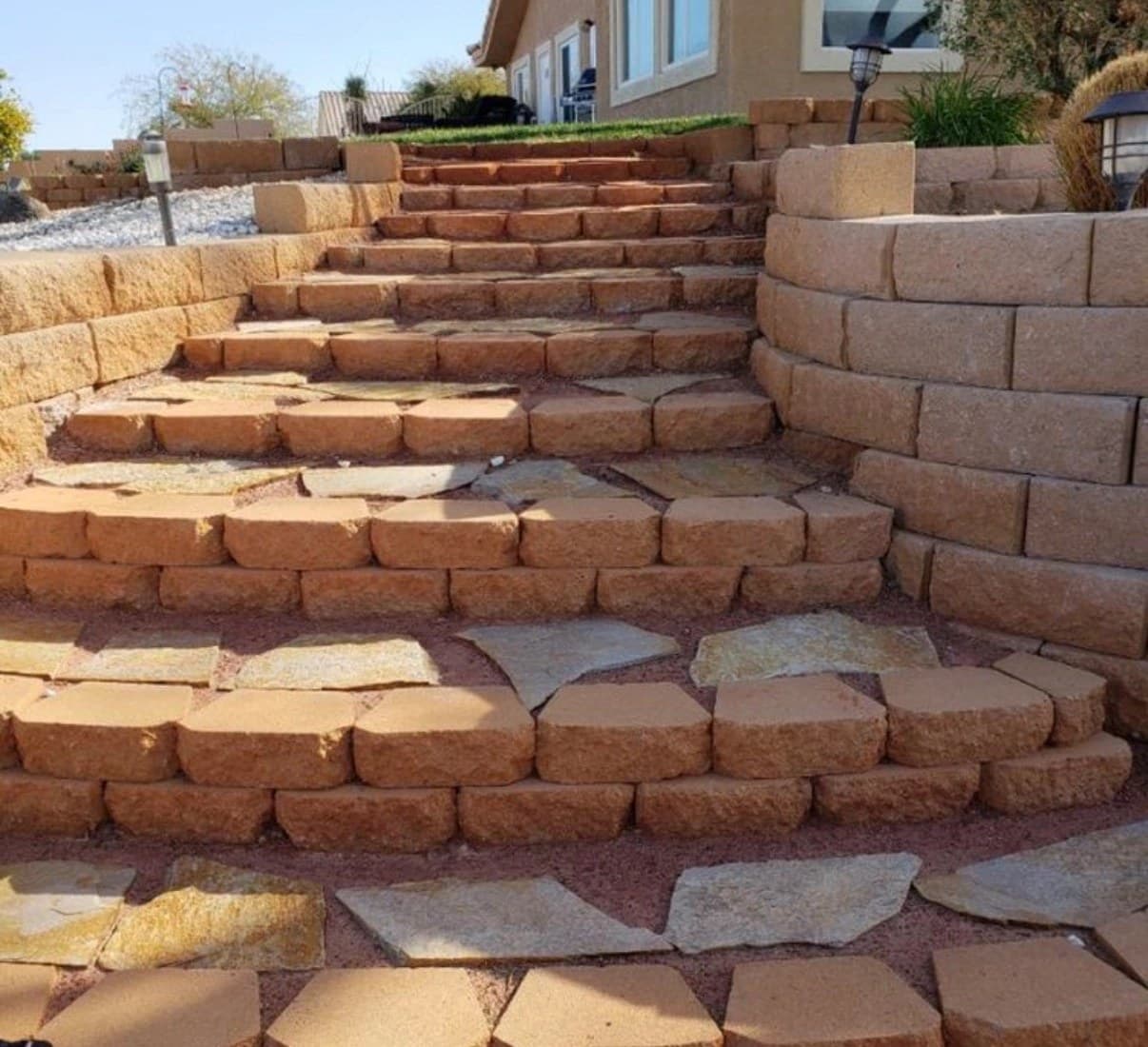 Flagstone and block retaining-wall steps cleaned up and finished on a Las Vegas hillside property